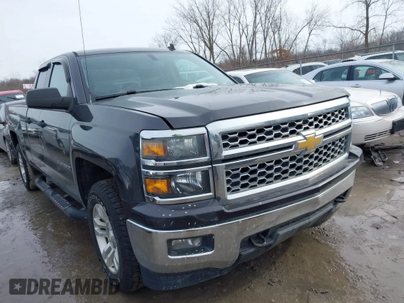 2014 Chevrolet Silverado 1500 LT with VIN 1GCVKREC2EZ149018, listed as a IAAI auction lot 41403200 with 153,760 mi miles and . Bid and sale history available at DreamBid. Image 1.