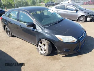 2013 Ford Focus SE z VIN 1FADP3F27DL330672, wystawiony jako IAAI lot #42168821 z przebiegiem 192 537 mil mil oraz . Historia ofert i sprzedaży dostępna na DreamBid. Obrazek 1.