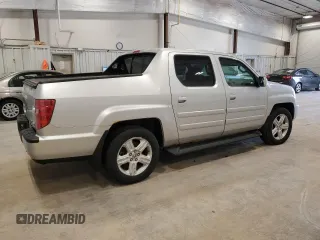 2009 Honda Ridgeline RTL with VIN 5FPYK16569B101779, listed as a Copart auction lot 56175705 with 275,282 mi miles and Clean Title. Bid and sale history available at DreamBid. Image 3.