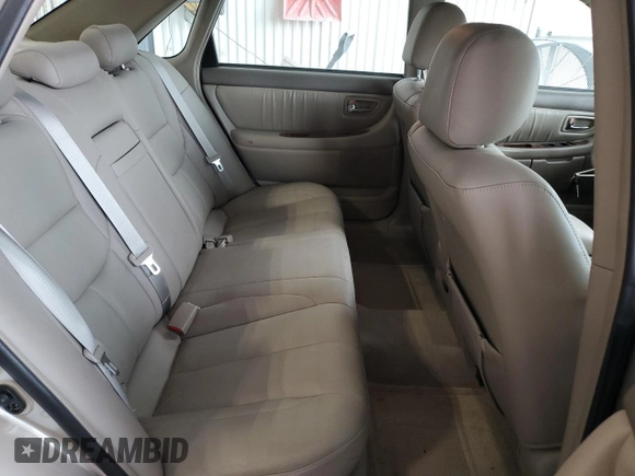 2003 Toyota Avalon XL z VIN 4T1BF28B03U280486, wystawiony jako Copart lot #57152935 z przebiegiem 131 996 mil mil oraz Szkoda całkowita • Salvage title. Historia ofert i sprzedaży dostępna na DreamBid. Obrazek 10.