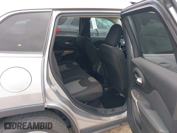 2018 Jeep Cherokee Latitude with VIN 1C4PJLCX4JD559096, listed as a IAAI auction lot 41925282 with 127,488 mi miles and . Bid and sale history available at DreamBid. Image 8.