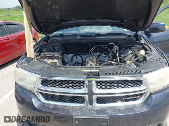 2013 Dodge Durango SXT z VIN 1C4RDHAG0DC592848, wystawiony jako IAAI lot #42177649 z przebiegiem Nie podano mil oraz . Historia ofert i sprzedaży dostępna na DreamBid. Obrazek 10.