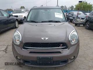 2015 MINI Countryman S z VIN WMWZC3C53FWT02232, wystawiony jako IAAI lot #42204694 z przebiegiem 107 544 mil mil oraz . Historia ofert i sprzedaży dostępna na DreamBid. Obrazek 6.