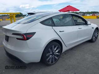 2024 Tesla Model 3 with VIN 5YJ3E1EA6RF751009, listed as a IAAI auction lot 40537919 with Not Provided miles and . Bid and sale history available at DreamBid. Image 4.