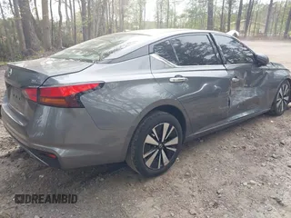 2019 Nissan Altima SL z VIN 1N4BL4EV4KC256015, wystawiony jako IAAI lot #42041439 z przebiegiem 104 888 mil mil oraz . Historia ofert i sprzedaży dostępna na DreamBid. Obrazek 4.