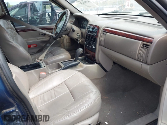 2001 Jeep Grand Cherokee Limited with VIN 1J4GX58S01C657436, listed as a IAAI auction lot 42102133 with 194,897 mi miles and . Bid and sale history available at DreamBid. Image 5.