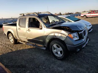 2007 Nissan Frontier SE with VIN 1N6AD09W47C438493, listed as a Copart auction lot 82595824 with 97,541 mi miles and Salvage title. Bid and sale history available at DreamBid. Image 4.