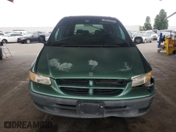 1999 Dodge Caravan with VIN 2B4GP25R8XR200747, listed as a Copart auction lot 58273225 with 182,147 mi miles and Salvage title. Bid and sale history available at DreamBid. Image 5.
