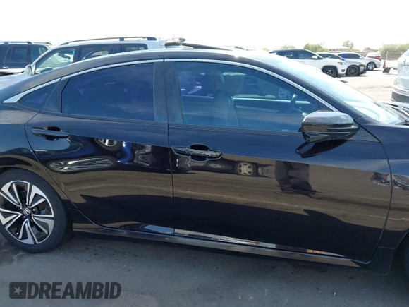 2018 Honda Civic EX-T z VIN 19XFC1F35JE200003, wystawiony jako IAAI lot #42393392 z przebiegiem 90 337 mil mil oraz . Historia ofert i sprzedaży dostępna na DreamBid. Obrazek 13.