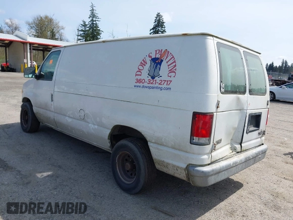 2000 Ford Econoline Cargo with VIN 1FTRE14W7YHA37668, listed as a IAAI auction lot 42001679 with 210,713 mi miles. Bid and sale history available at carsss.com. Image 3.