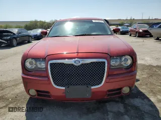 2010 Chrysler 300 with VIN 2C3CA2CV4AH330352, listed as a Copart auction lot 70720414 with 164,673 mi miles and Salvage Title. Bid and sale history available at carsss.com. Image 5.
