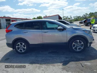2019 Honda CR-V EX z VIN 5J6RW1H51KA008613, wystawiony jako IAAI lot #42158496 z przebiegiem 47 369 mil mil oraz . Historia ofert i sprzedaży dostępna na DreamBid. Obrazek 13.