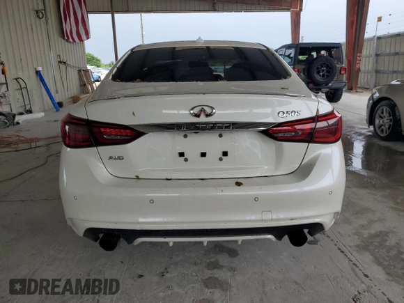 2019 Infiniti Q50 Luxe с VIN JN1EV7ARXKM594155, выставлен на аукционе Copart как лот 58713345 с пробегом 48 883 миль миль и Списание • Salvage title. История ставок и продаж доступна на DreamBid. Изображение 6.