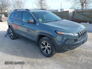 2014 Jeep Cherokee Trailhawk z VIN 1C4PJMBS5EW147579, wystawiony jako IAAI lot #41781543 z przebiegiem 155 751 mil mil oraz . Historia ofert i sprzedaży dostępna na DreamBid. Obrazek 1.