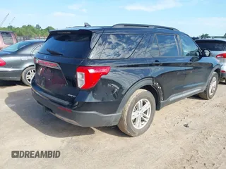 2022 Ford Explorer XLT with VIN 1FMSK8DH9NGB27633, listed as a IAAI auction lot 42117559 with 52,474 mi miles and . Bid and sale history available at DreamBid. Image 4.