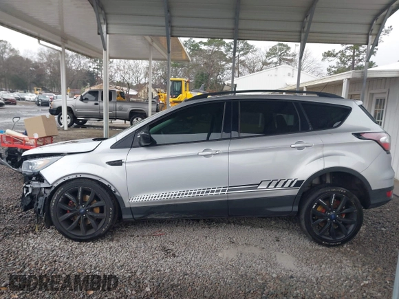 2018 Ford Escape SE z VIN 1FMCU9GD1JUB35184, wystawiony jako IAAI lot #41611285 z przebiegiem 142 267 mil mil oraz . Historia ofert i sprzedaży dostępna na DreamBid. Obrazek 15.