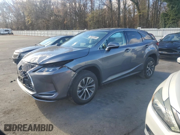 2021 Lexus RX with VIN 2T2AZMDA7MC275120, listed as a Copart auction lot 80251094 with 8,595 mi miles and Salvage Title. Bid and sale history available at carsss.com. Image 1.