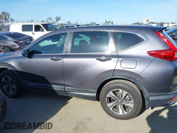 2019 Honda CR-V LX z VIN 2HKRW6H39KH219441, wystawiony jako IAAI lot #41912978 z przebiegiem 99 828 mil mil oraz . Historia ofert i sprzedaży dostępna na DreamBid. Obrazek 14.
