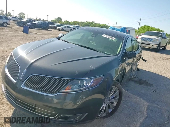 2014 Lincoln MKS EcoBoost z VIN 1LNHL9FT8EG607807, wystawiony jako Copart lot #57755915 z przebiegiem 203 316 mil mil oraz Szkoda całkowita • Salvage title. Historia ofert i sprzedaży dostępna na DreamBid. Obrazek 13.