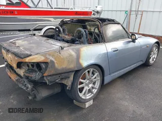 2005 Honda S2000 с VIN JHMAP21485S001159, выставлен на аукционе IAAI как лот 38590034 с пробегом Не указан миль и . История ставок и продаж доступна на DreamBid. Изображение 4.