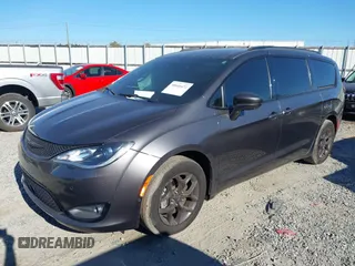 2020 Chrysler Pacifica Touring with VIN 2C4RC1FG1LR245764, listed as a IAAI auction lot 40646472 with 86,119 mi miles and . Bid and sale history available at DreamBid. Image 17.