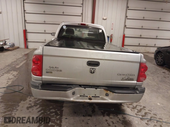 2010 Dodge Dakota with VIN 1D7CW3BP7AS103645, listed as a IAAI auction lot 41514841 with 158,125 mi miles and . Bid and sale history available at DreamBid. Image 17.