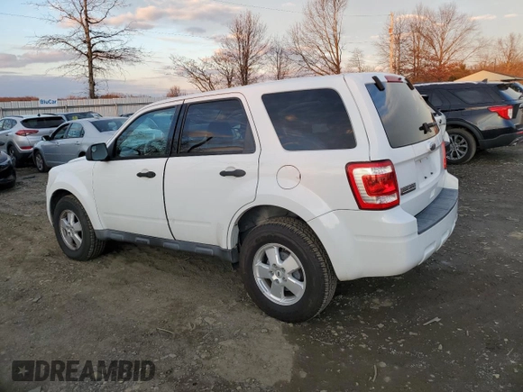 2010 Ford Escape XLS with VIN 1FMCU9C71AKC41887, listed as a Copart auction lot 87117884 with 126,687 mi miles and Clean title. Bid and sale history available at DreamBid. Image 2.
