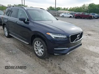 2016 Volvo XC90 T6 Momentum with VIN YV4A22PK7G1058660, listed as a IAAI auction lot 42201130 with 130,487 mi miles. Bid and sale history available at carsss.com. Image 1.