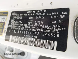 2018 Kia Optima S with VIN 5XXGT4L3XJG244516, listed as a IAAI auction lot 42136414 with 96,000 mi miles and . Bid and sale history available at DreamBid. Image 9.