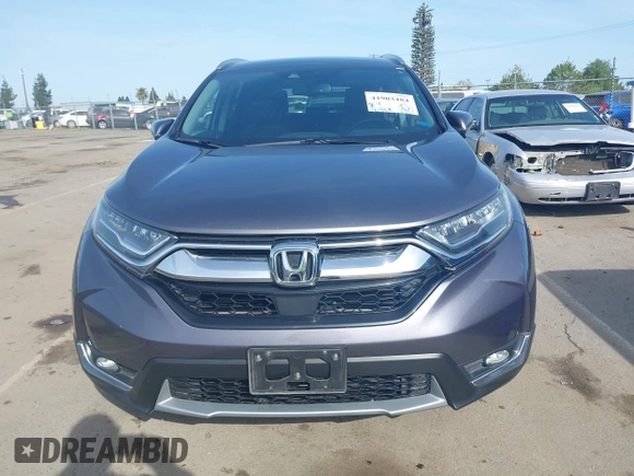 2018 Honda CR-V Touring with VIN 7FARW1H93JE027294, listed as a IAAI auction lot 41903484 with 80,999 mi miles and . Bid and sale history available at DreamBid. Image 13.