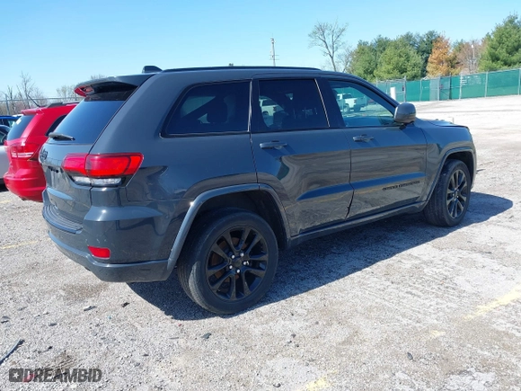 2018 Jeep Grand Cherokee Laredo E with VIN 1C4RJFAG2JC420927, listed as a IAAI auction lot 41962579 with 90,898 mi miles. Bid and sale history available at carsss.com. Image 4.
