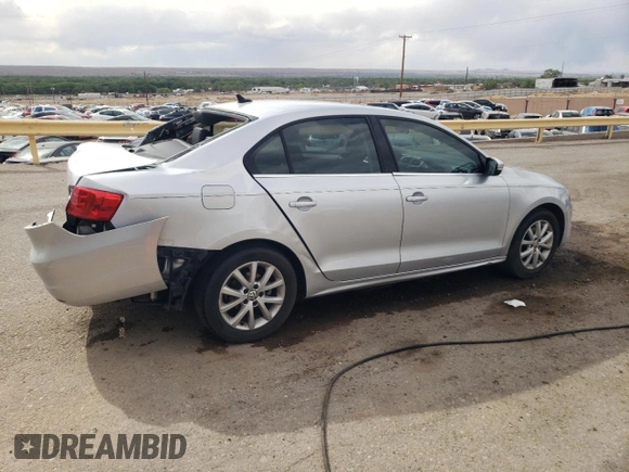 2014 Volkswagen Jetta SE with VIN 3VWD07AJ4EM427734, listed as a Copart auction lot 55093165 with 117,260 mi miles and Salvage title. Bid and sale history available at DreamBid. Image 3.