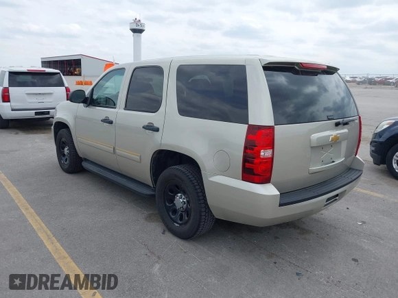 2013 Chevrolet Tahoe Commercial with VIN 1GNLC2E07DR266441, listed as a IAAI auction lot 42062162 with 133,321 mi miles and . Bid and sale history available at DreamBid. Image 3.