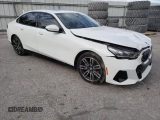 2024 BMW 5 Series 530i with VIN WBA43FJ02RCR63663, listed as a Copart auction lot 86215024 with 3,328 mi miles and Salvage Title. Bid and sale history available at carsss.com. Image 4.