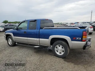 2004 GMC Sierra 1500 SLE with VIN 1GTEK19T34Z267816, listed as a Copart auction lot 54185515 with 214,695 mi miles and Salvage title. Bid and sale history available at DreamBid. Image 2.