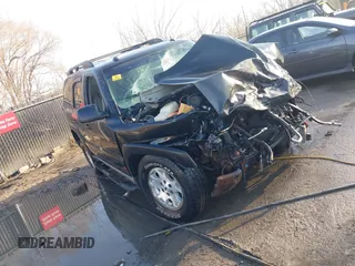 2005 Chevrolet Tahoe LT z VIN 1GNEK13T85R169737, wystawiony jako IAAI lot #41768722 z przebiegiem Nie podano mil oraz . Historia ofert i sprzedaży dostępna na DreamBid. Obrazek 1.