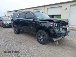 2016 Chevrolet Tahoe LT z VIN 1GNSKBKC6GR210329, wystawiony jako IAAI lot #42126175 z przebiegiem 190 207 mil mil oraz . Historia ofert i sprzedaży dostępna na DreamBid. Obrazek 1.
