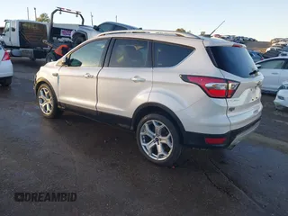 2017 Ford Escape Titanium with VIN 1FMCU0J98HUA75690, listed as a IAAI auction lot 41358534 with 90,376 mi miles. Bid and sale history available at carsss.com. Image 3.