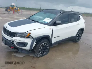 2020 Jeep Compass Trailhawk with VIN 3C4NJDDB3LT118928, listed as a IAAI auction lot 42128120 with 95,477 mi miles and . Bid and sale history available at DreamBid. Image 2.