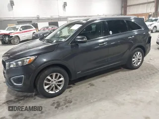 2016 Kia Sorento LX with VIN 5XYPGDA39GG170291, listed as a IAAI auction lot 42045883 with 136,848 mi miles. Bid and sale history available at carsss.com. Image 2.