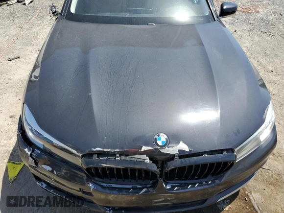 2017 BMW 7 Series 740i z VIN WBA7E2C30HG741105, wystawiony jako Copart lot #56632005 z przebiegiem 95 162 mil mil oraz Czysty tytuł • Clean title. Historia ofert i sprzedaży dostępna na DreamBid. Obrazek 11.