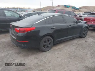 2014 Kia Optima LX with VIN 5XXGM4A73EG280685, listed as a IAAI auction lot 41190691 with 153,957 mi miles. Bid and sale history available at carsss.com. Image 4.