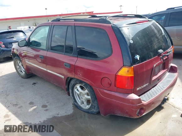 2006 GMC Envoy SLE z VIN 1GKDS13S362314323, wystawiony jako IAAI lot #42476958 z przebiegiem 164 322 mil mil oraz . Historia ofert i sprzedaży dostępna na DreamBid. Obrazek 3.