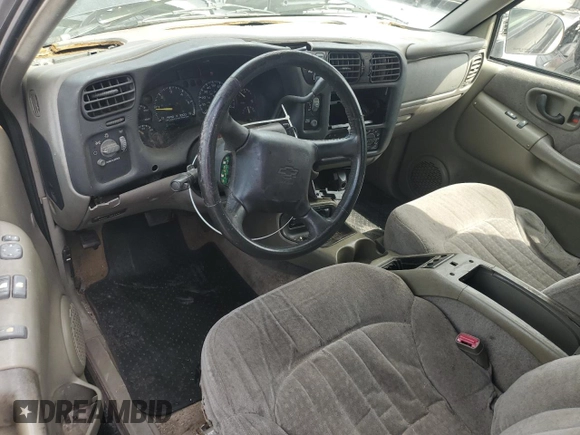 1999 Chevrolet Blazer LS with VIN 1GNCT18W6XK224253, listed as a Copart auction lot 50708405 with 209,711 mi miles and Salvage title. Bid and sale history available at DreamBid. Image 8.