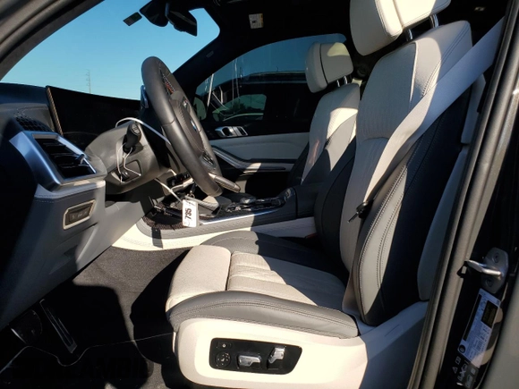 2024 BMW X7 M60i with VIN 5UX33EM00R9V42847, listed as a Copart auction lot 46498875 with 6,310 mi miles and Salvage Title. Bid and sale history available at carsss.com. Image 7.