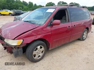 2002 Honda Odyssey EX with VIN 5FNRL18612B028570, listed as a IAAI auction lot 42491201 with 203,401 mi miles and . Bid and sale history available at DreamBid. Image 2.