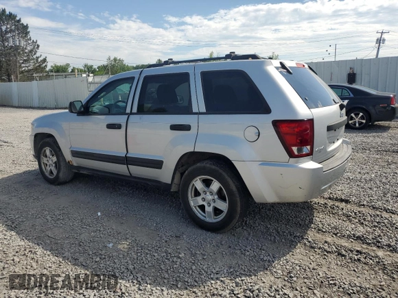 2005 Jeep Grand Cherokee Laredo with VIN 1J4GR48KX5C565762, listed as a Copart auction lot 63080115 with 122,349 mi miles and Salvage title. Bid and sale history available at DreamBid. Image 2.