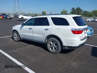 2013 Dodge Durango Crew with VIN 1C4RDJDG0DC670810, listed as a IAAI auction lot 41974024 with 209,379 mi miles and . Bid and sale history available at DreamBid. Image 3.