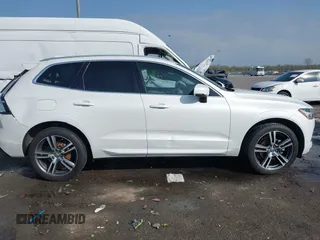 2019 Volvo XC60 Momentum with VIN LYV102DK0KB219297, listed as a IAAI auction lot 41781458 with 80,524 mi miles and . Bid and sale history available at DreamBid. Image 13.