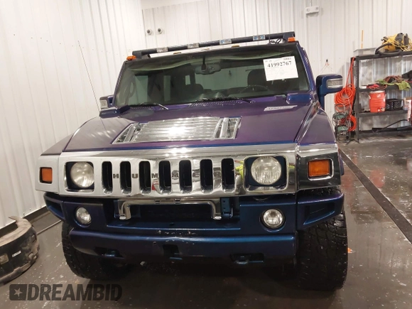 2006 Hummer H2 z VIN 5GRGN22U06H103603, wystawiony jako IAAI lot #41992767 z przebiegiem 165 782 mil mil oraz . Historia ofert i sprzedaży dostępna na DreamBid. Obrazek 13.